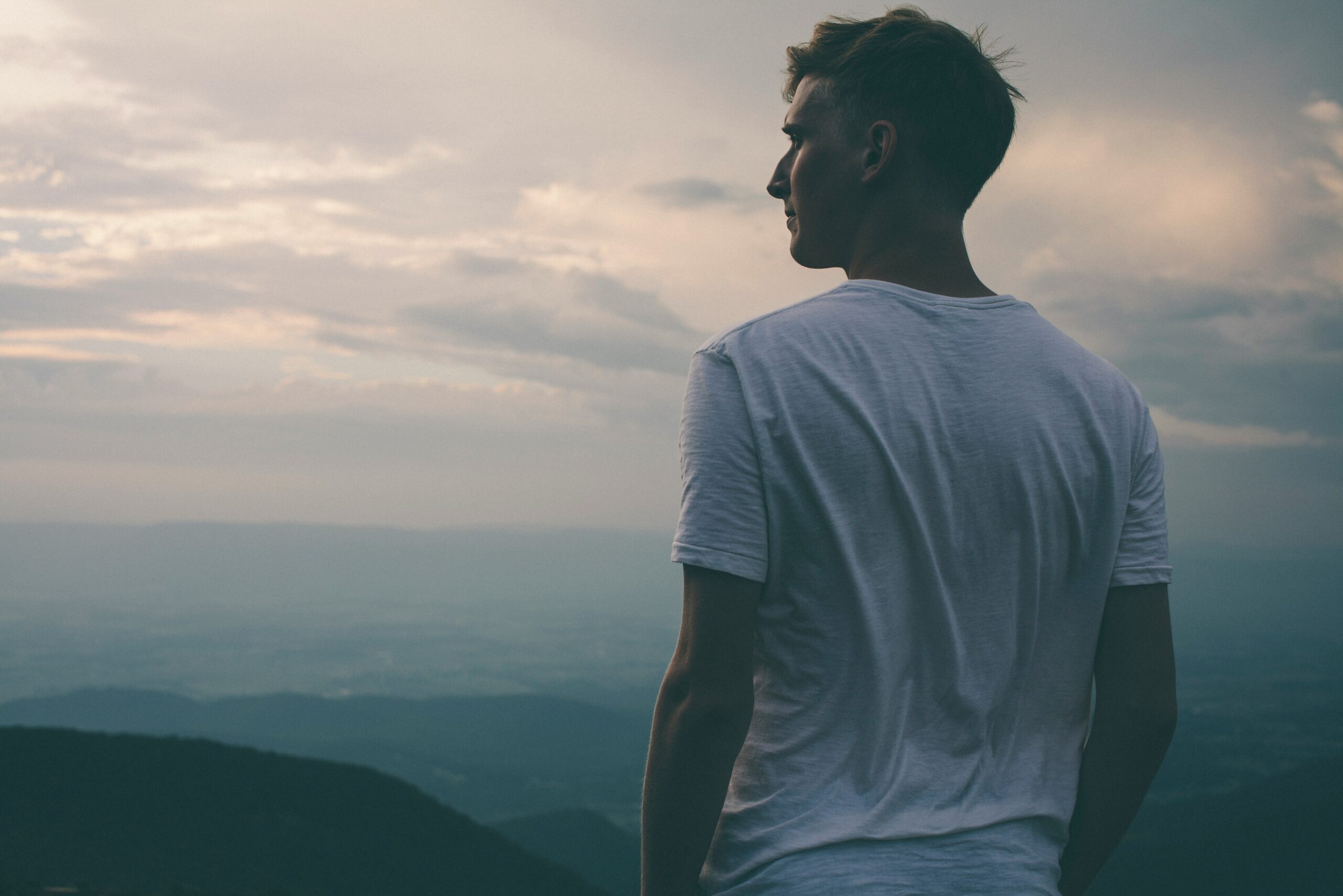 a man looking at a view