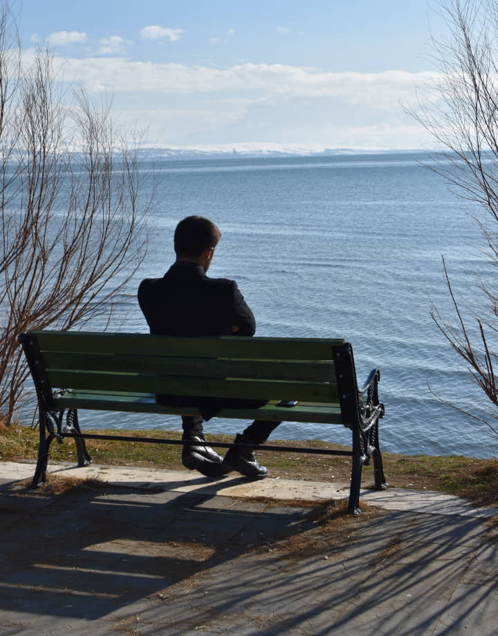 man on bench alone